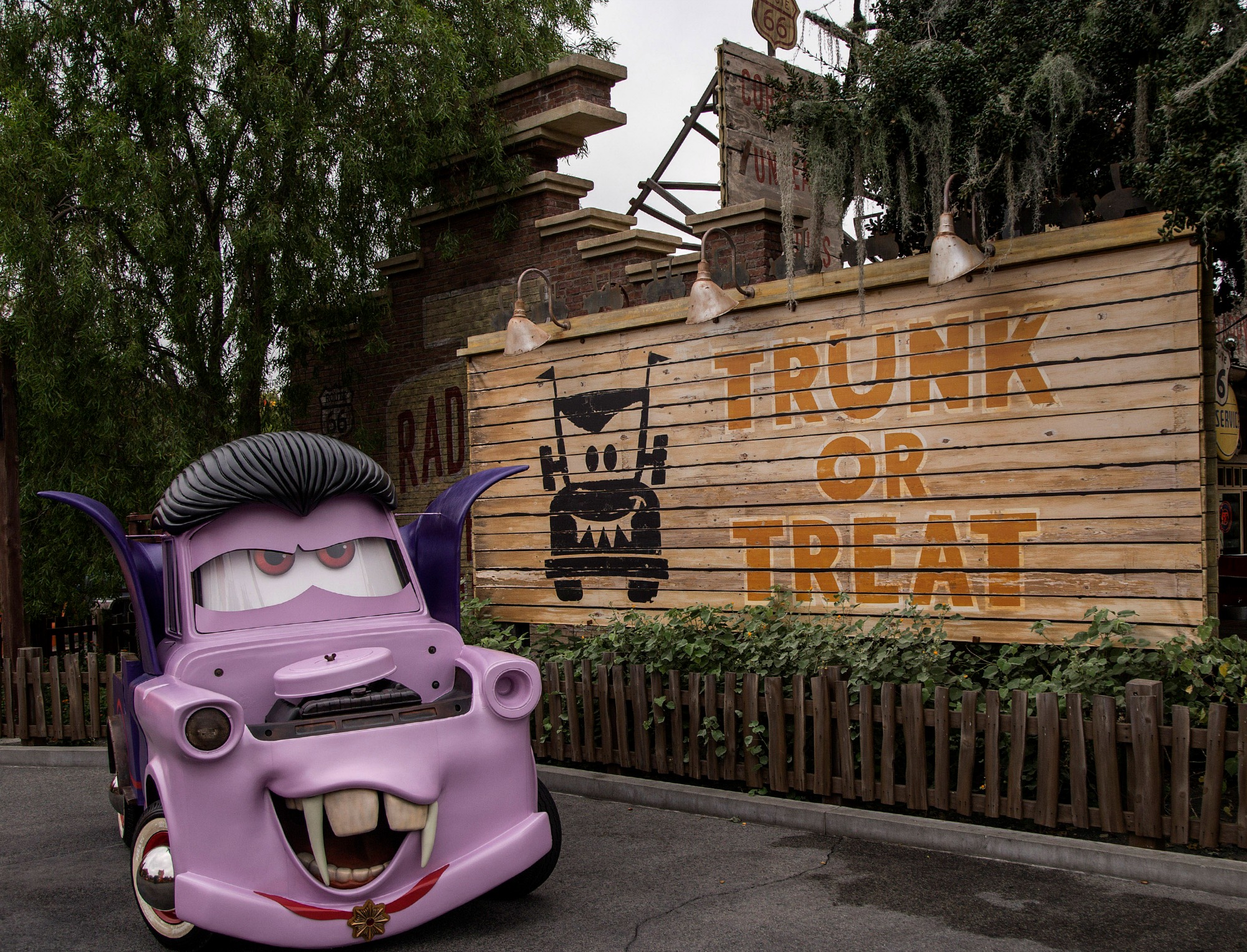 CARS LAND HAUL-O-WEEN - Everyone’s favorite Cars characters have transformed Radiator Springs into their own Haul-O-Ween celebration during Halloween Time at the Disneyland Resort. For the first time, the Cars characters will be donning their Halloween “car-stumes” as they greet guests and prepare to go “trunk-or-treating.” Mater will be wearing his vampire or “van-pire” outfit, while Lightning McQueen is dressed as a super hero. Cruz Ramirez, Red the Fire Truck and DJ get dressed up as a pirate, a clown and a punk rocker, respectively.(Joshua Sudock/Disneyland Resort)